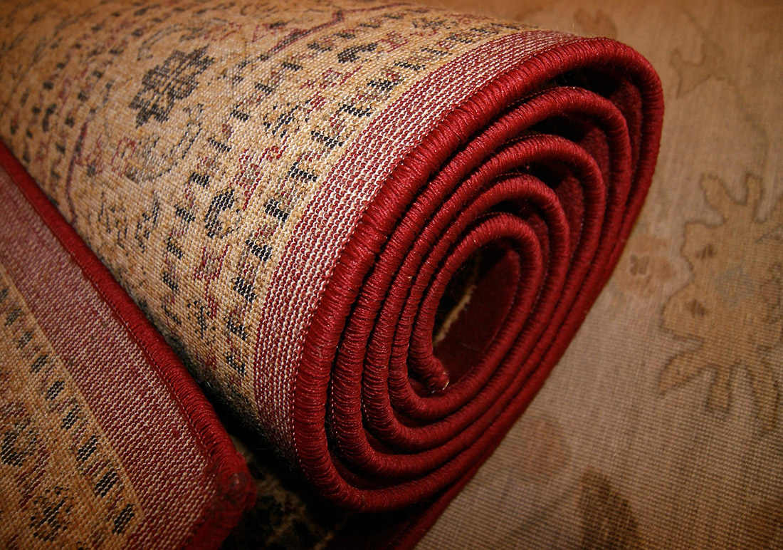 Image of rolled up area rug